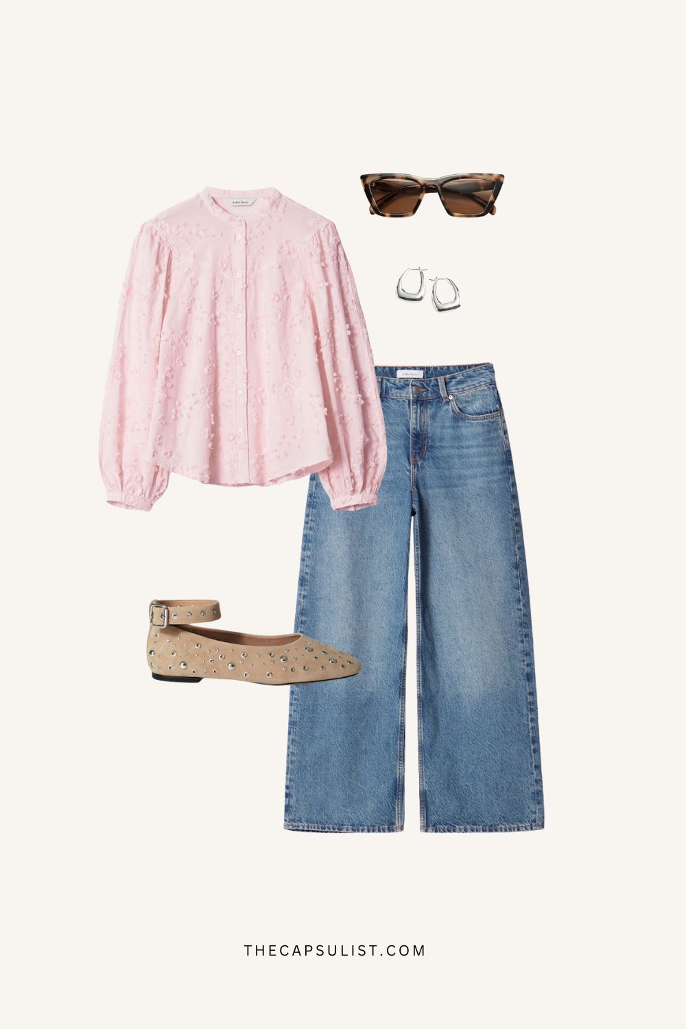 A fresh and feminine spring outfit featuring a soft pink blouse, wide-leg blue denim jeans, embroidered ballet flats, tortoise sunglasses, and silver hoop earrings.