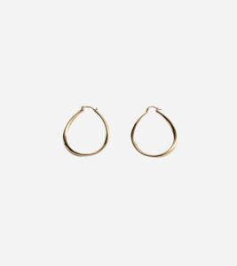 Minimalist gold hoop earrings from Mango – lightweight and timeless for capsule looks.