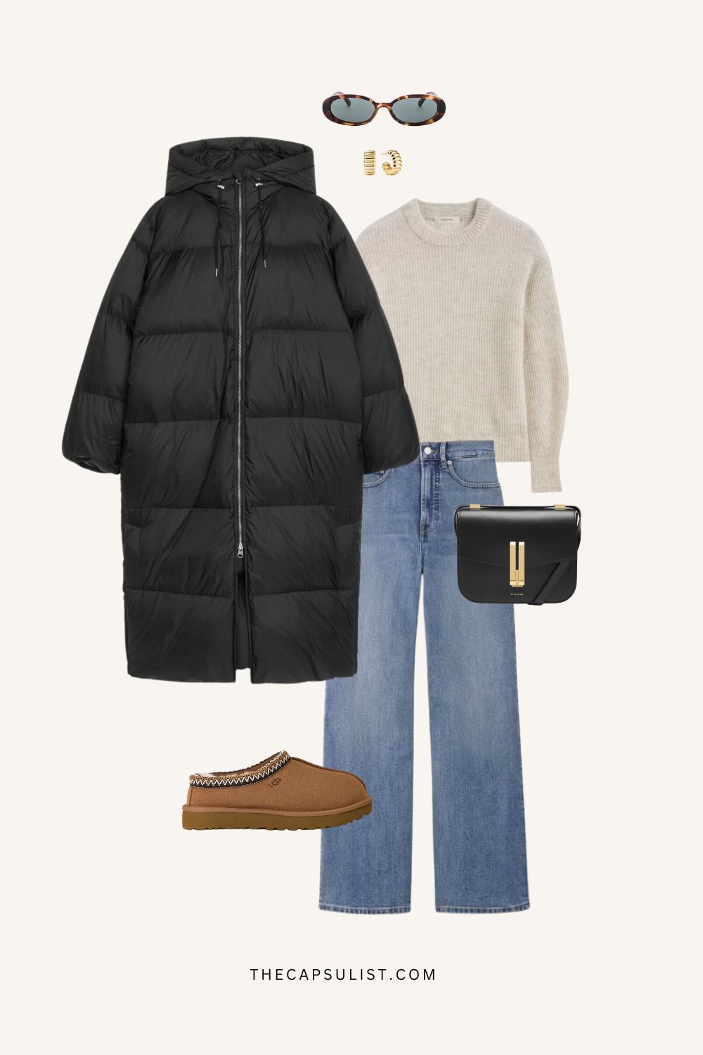 Cozy winter travel capsule outfit with a long puffer coat, knit sweater, straight-leg jeans, walkable clogs, and minimalist accessories for winter city travel.