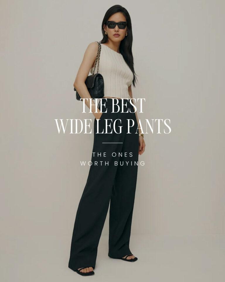 Woman wearing black wide leg pants with a cream sleeveless top